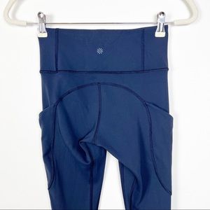 Athleta Navy Leggings with Side Pockets in Size XXS.